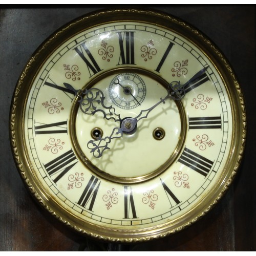 154 - An early 20th century mahogany vienna wall clock, 129cm high.