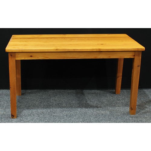 166 - A farmhouse pine dining table, rectangular top, tapered square legs, 137cm wide, 74cm high; a set of... 