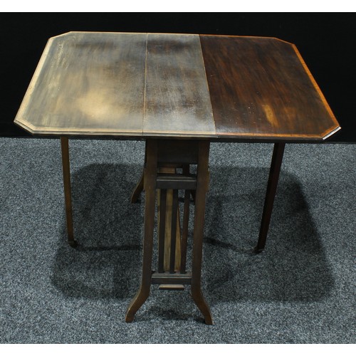 169 - An Edwardian sutherland table.