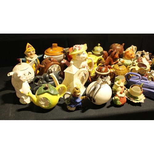 267 - A collection of novelty teapots, including a Price Kensington toby style teapot; Santa Clause teapot... 