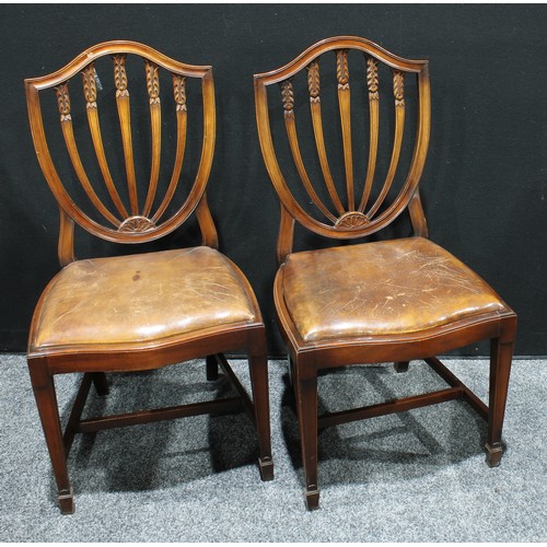 227 - A set of six Hepplewhite style mahogany dining chairs, shield shaped back with carved splats, drop-i... 