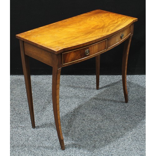 298 - A George III style bow front mahogany side table, oversailing top above two short cockbeaded drawers... 