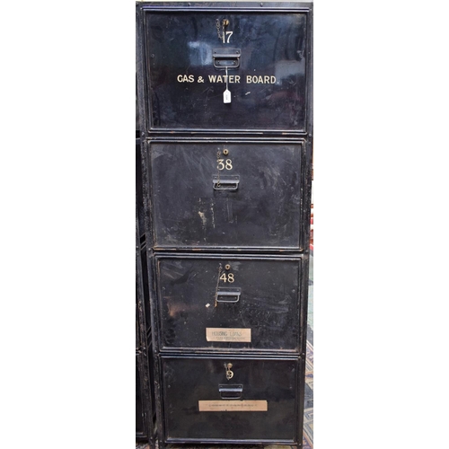 12A - An early 20th century safe archive filing system, composed of an open wrought metal frame housing ei... 