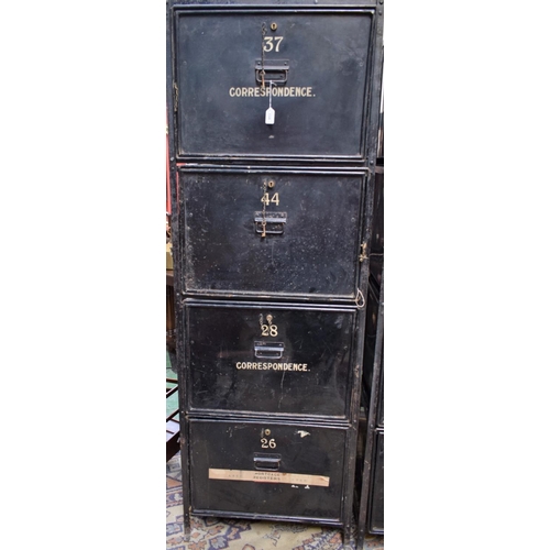 13A - An early 20th century safe archive filing system, composed of an open wrought metal frame housing ei... 