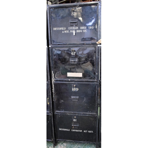 15A - An early 20th century safe archive filing system, composed of an open wrought metal frame housing ei... 