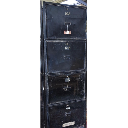 17A - An early 20th century safe archive filing system, composed of an open wrought metal frame housing ei... 