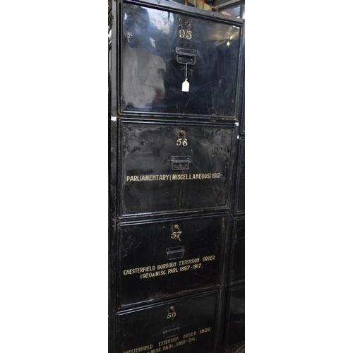 18A - An early 20th century safe archive filing system, composed of an open wrought metal frame housing ei... 