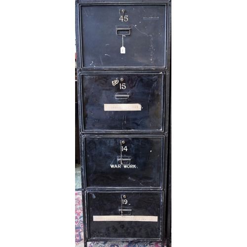 19A - An early 20th century safe archive filing system, composed of an open wrought metal frame housing ei... 