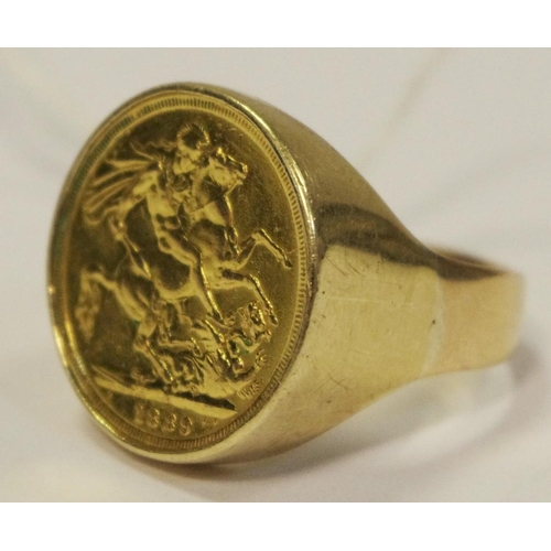 240 - A Victorian sovereign ring, 9ct golf mount 16.9g gross