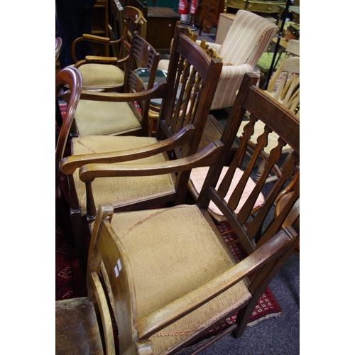 519 - A pair of oak carver dining chairs; a bentwood chair; an early 20th century dining chair a kitchen c... 