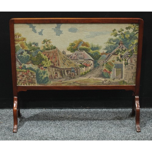 301 - An early 20th century mahogany firescreen, c.1920; a mahogany nest of tables; an Edwardian mahogany ... 