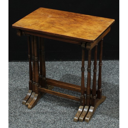 301 - An early 20th century mahogany firescreen, c.1920; a mahogany nest of tables; an Edwardian mahogany ... 