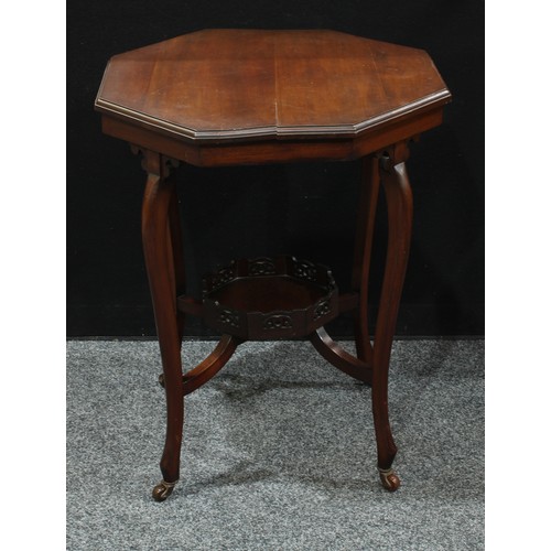 293 - An Edwardian mahogany octagonal occasional table, pierced under tier, four legs with casters, 73cm h... 