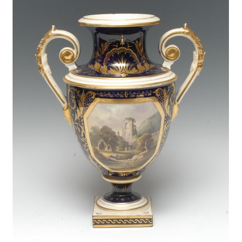 132 - A Derby Named View two-handled pedestal ovoid vase, painted with Kirkstall Abbey, within a canted re... 