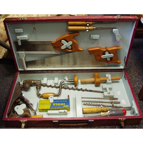 300 - A fitted Carpenter's tool case with Stanley Bailey No. 4, Stanley brace; bits; India oilstone; Spear... 