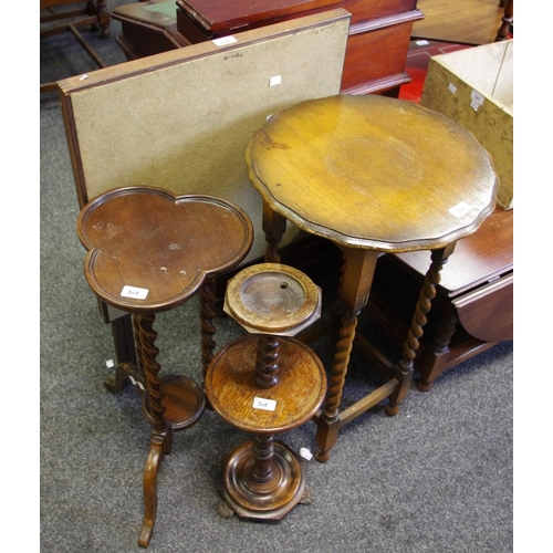 305 - A mahogany occasional table, shaped dished top, three barley twist columns, circular undertier, cabr... 