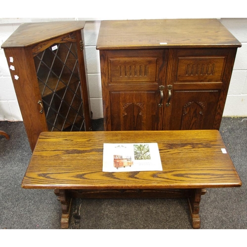 334 - An oak wall mounted corner cabinet, lead glazed door by Webber Furniture; a Webber Furniture oak cof... 