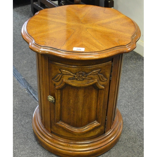 346 - An American Drexel walnut round drinks cabinet