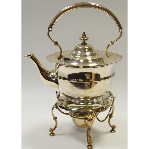 361 - An early 20th century Sheffield silver plate kettle on stand, burner en suite, shaped legs