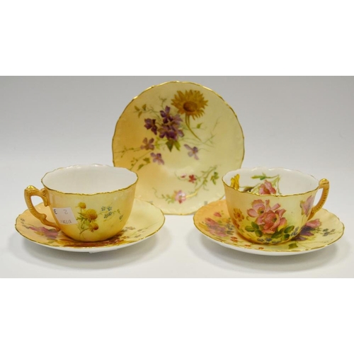 370 - Two Royal Worcester cabinet cups and saucers, printed and painted with summer flowers on a blush ivo... 