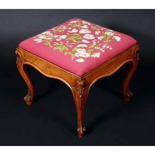 1694 - A Victorian walnut square stool, drop-in Berlin woolwork seat, cabriole legs carved with acanthus, s... 