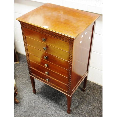 127 - An Edwardian mahogany six drawer music cabinet, moulded top, tapering square legs, spade feet, blind... 