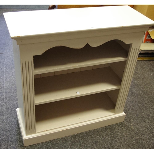 142 - An early 20th century painted bookcase, three shelves, fluted to frieze, c. 1940.