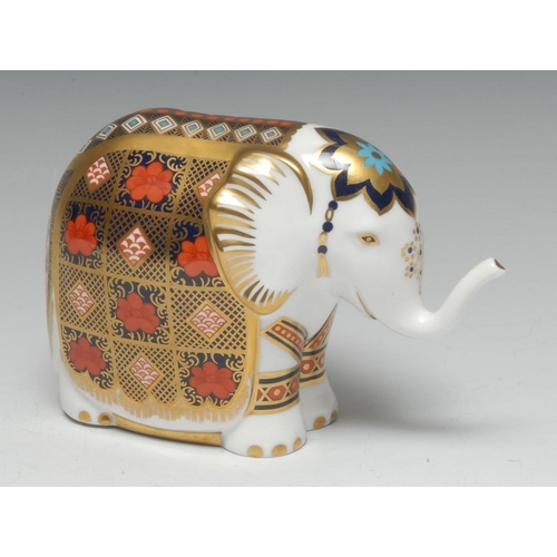 271 - A Royal Crown Derby paperweight, Elephant, decorated in the 1128 Imari palette, specially commission... 