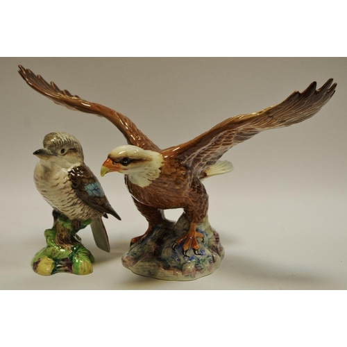 18 - A Beswick model of a bald eagle on a rocky outcrop, impressed pattern no. 1018; a Beswick model Kook... 