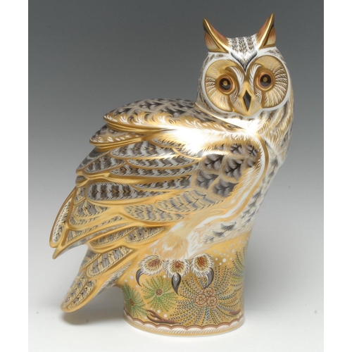 299 - A Royal Crown Derby paperweight, Long Eared Owl, modelled by Donald Brindley, designed by Tien Manh ... 