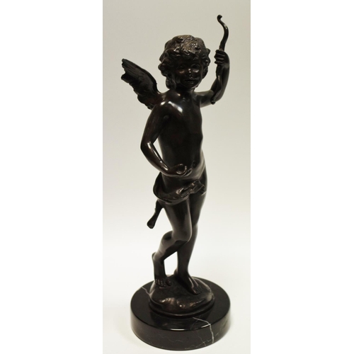 21 - A cast bronze figure of Cupid on a circular marble base, signed Mozeou Scuepteur