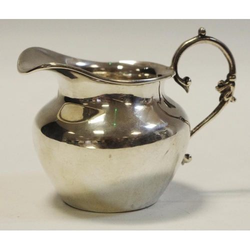 229 - An Edwardian silver cream jug, Birmingham 1902