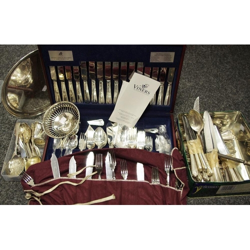 255 - Plated ware - a canteen of Viners cutlery; other flatware including berry spoons; a bonbon dish.