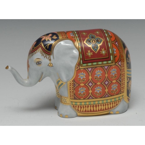 358 - A Royal Crown Derby paperweight, The Mulberry Hall Baby Elephant, specially commissioned by Mulberry... 