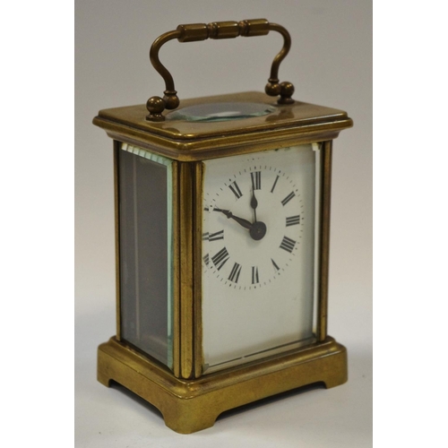 3 - An early 20th century lacquered brass carriage clock