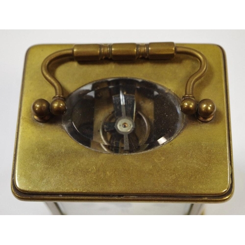 3 - An early 20th century lacquered brass carriage clock