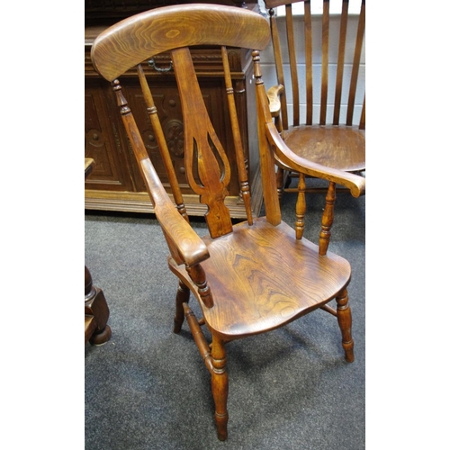 305 - An elm spindle back chair, vasular shaped splat, outswept arms, saddle seat, double H stretchers, tu... 