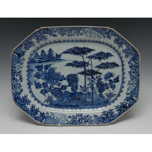 422 - A Chinese canted rectangular meat plate, painted in underglaze blue with the Three Friends of Winter... 