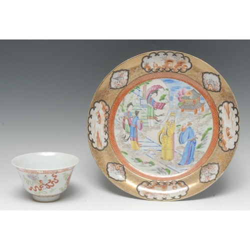 427A - A Chinese circular plate, decorated in polychrome with elder, oriental figures and pagoda, the rim w... 