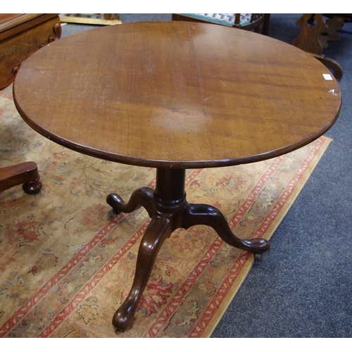 317 - A George III mahogany tilt top centre table