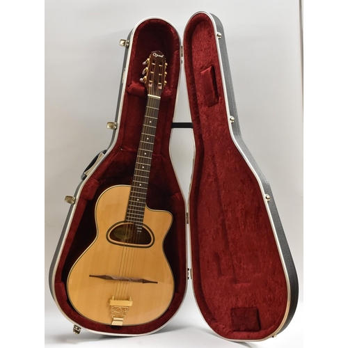 3002 - An Ozark 3513 six string acoustic 'Jazz' Guitar. Having a fine Spruce soundboard, ivorine binding, m... 