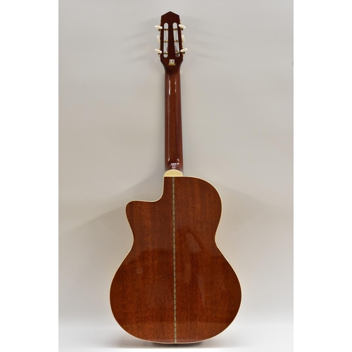 3002 - An Ozark 3513 six string acoustic 'Jazz' Guitar. Having a fine Spruce soundboard, ivorine binding, m... 