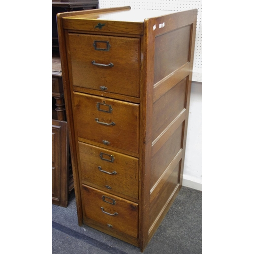 355 - An oak four drawer filing cabinet circa 1930.