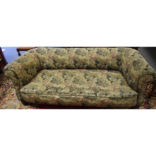 361 - A Victorian scroll arm sofa.