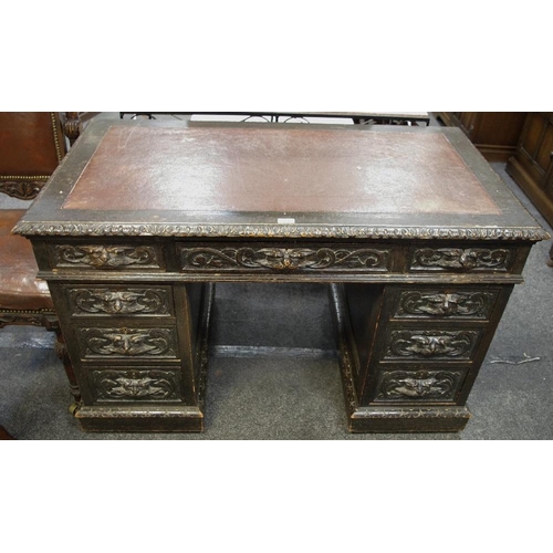 375 - A dark oak pedestal desk, leather inlaid top, one long drawer and two short to frieze, kneehole flan... 