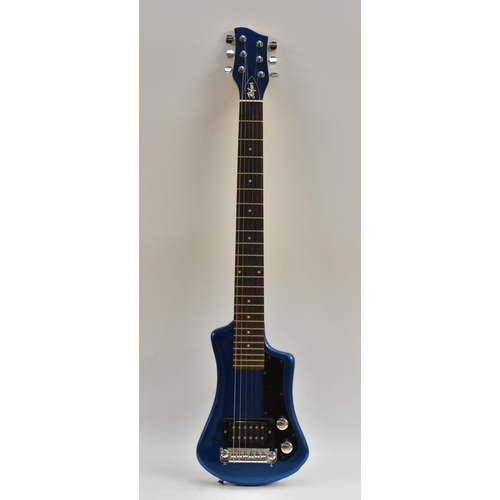 3043 - A Hofner HCT Shorty Electric Guitar in blue finish, total length 82cm, complete with case.