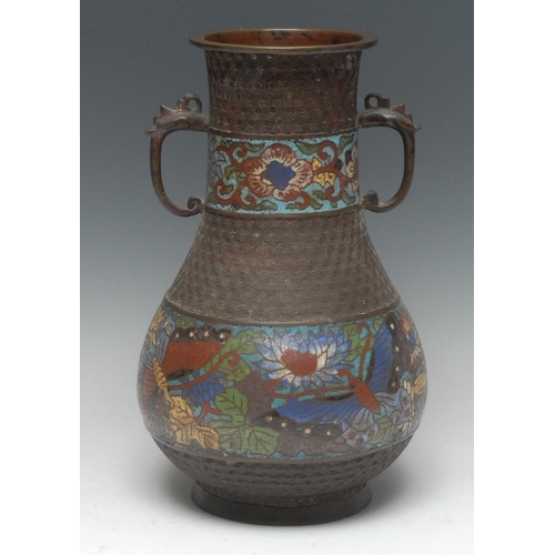 511 - A late 19th century Chinese champlevé enamel and brown-patinated bronze baluster vase, decorated in ... 