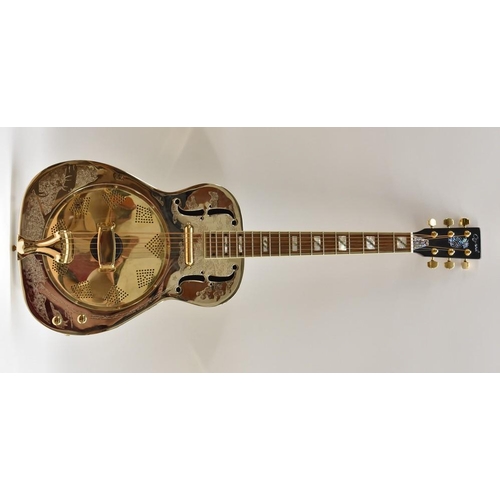 3046 - An Ozark Resonator Guitar, engraved nickel-plated solid brass body, abalone and mother-of-pear inlay... 