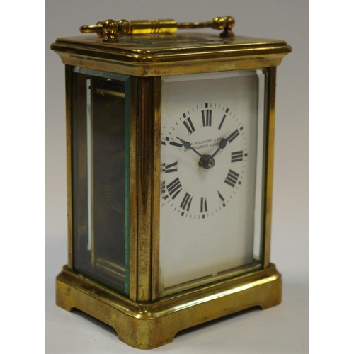 5 - An early 20th century lacquered brass carriage clock