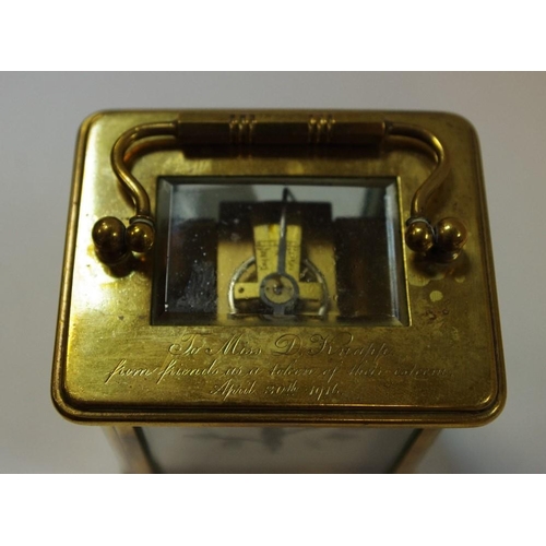 5 - An early 20th century lacquered brass carriage clock